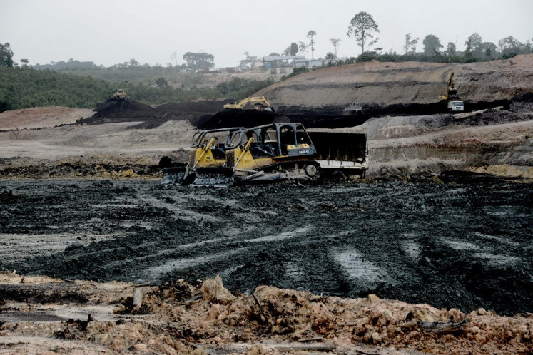 This picture taken on May 19, 2017 shows an open-pit coal mine in Jambi.