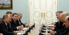 Russian Prime Minister Vladimir Putin (left) and US Vice President Joe Biden (2nd right) meet on March 10, 2011 with their delegations in Moscow. 