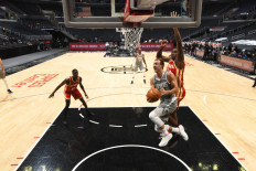 Luke Kennard #5 of the LA Clippers shoots the ball during the game against the Atlanta Hawks on March 22, 2021 at STAPLES Center in Los Angeles, California.