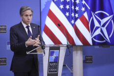 US Secretary of State Antony Blinken holds a press briefing at the end of a NATO Foreign Ministers' meeting at the Alliance's headquarters in Brussels on March 24, 2021. The foreign ministers met in person for the first time in more than a year. They prepared for an upcoming summit by discussing a set of proposals to reform the military alliance.
