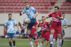 Norway's midfielder Kristian Thorstvedt (L) vies with Gibraltar's midfielder Jayce Olivero during the FIFA World Cup Qatar 2022 qualification football match between Gibraltar and Norway on March 24 at the Victoria Stadium in Gibraltar.
