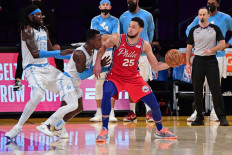 Ben Simmons #25 of the Philadelphia 76ers passes the ball against the Los Angeles Lakers on March 25, 2021 at STAPLES Center in Los Angeles, California.