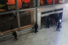 People walk outside of the Goldman Sachs New York headquarters on April 15, 2019 in New York City. 