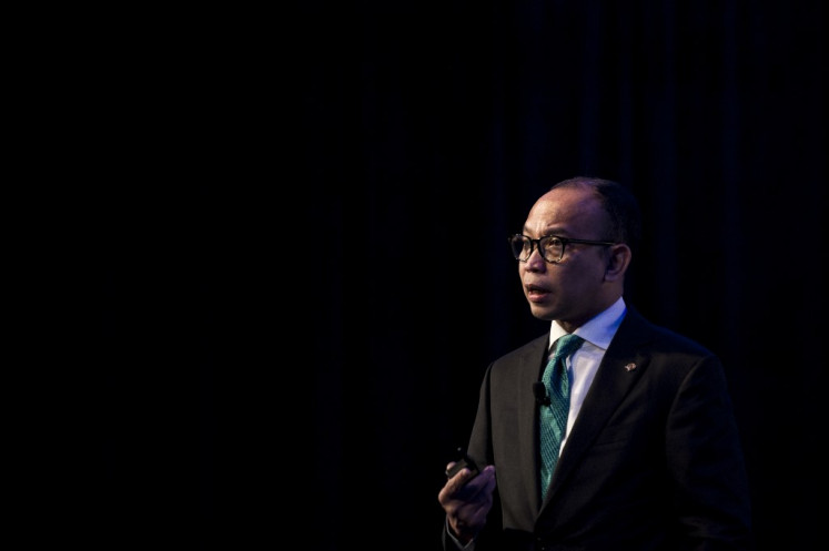 Finance Minister Chatib Basri speaks on Sept. 18, 2014, at the 21st CLSA Investors' Forum in Hong Kong, China.