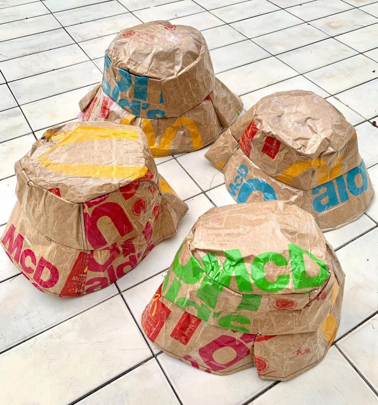 Bucket hats made from used paper bags from fast-food chains.