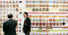 Packages of instant ramen introduced by Japan's Nissin Food Products Co. since 1958 are displayed on a wall at the refurbished Instant Ramen Museum in Osaka, 25 November 2004. The museum will be opened to the public from 26 November. In 1958 Nissin introduced 