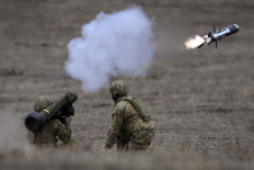 Australian Army soldiers fire a Javelin anti-tank missile during Excercise Chong Ju, a live fire demonstration showcasing the army's joint combined arms capabilities at the Puckapunyal Military Base some 100 kilometres north of Melbourne on May 9, 2019. 