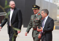 Jordanian princes Hashem bin al-Hussein (left) Hamza bin al-Hussein (right) and Rashed bin al-Hassan (right) arrive at the opening of the Special Operations Forces Exhibition and Conference (SOFEX) in the Jordanian capital Amman on May 8, 2018 