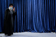 A handout picture provided by the office of Iran's Supreme Leader Ayatollah Ali Khamenei on January 8, 2021 shows him arriving to deliver a televised speech on the occasion of the 43rd anniversary of 1978 revolt in Qom which ignited the Iranian Revolution. Iran is in no hurry to see the US return to a 2015 nuclear deal with major powers after Joe Biden takes office this month, its supreme leader said.
