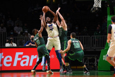 Joel Embiid #21 of the Philadelphia 76ers drives to the basket against the Boston Celtics on April 6, 2021, 2021 at the TD Garden in Boston, Massachusetts.