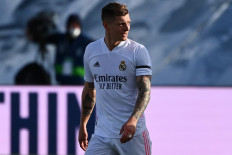 Real Madrid's German midfielder Toni Kroos reacts after scoring a goal during the Spanish league football match between Real Madrid and Valencia at the Alfredo di Stefano stadium in Valdebebas on the outskirts of Madrid on February 14, 2021.