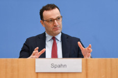 German Health Minister Jens Spahn gestures as he speaks during a news conference about the start of the vaccination process against COVID-19 coronavirus disease at doctor's general practices, in Berlin, Germany, on April 1, 2021. 