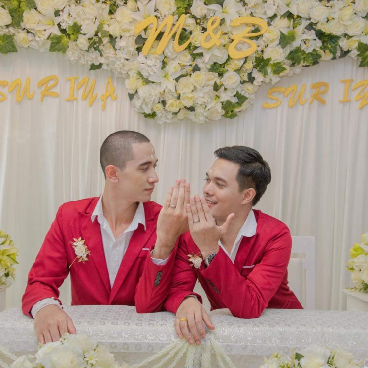 Shocked by Indonesia: Suriya Kertsang, 28, and his partner Suriya Manusonth, 24, received verbal harassment and even death threats from the Indonesian internet users after posting their commitment ceremonies on Kertsang's Facebook account.

