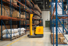 A man works in a Shipper warehouse in Indonesia.