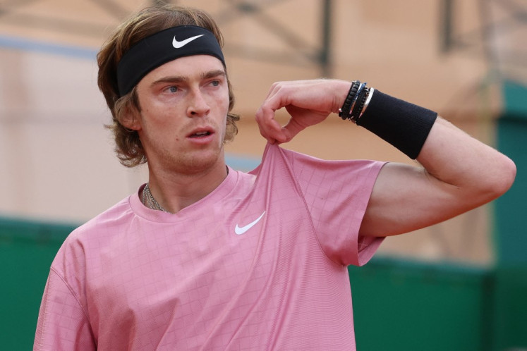 Russia's Andrey Rublev gestures during his quarter final singles match against Spain's Rafael Nadal on day seven of the Monte-Carlo ATP Masters Series tournament in Monaco on April 16, 2021.