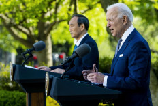 US President Joe Biden (R) and Prime Minister Yoshihide Suga of Japan hold a news conference in the Rose Garden of the White House on April 16, 2021 in Washington, DC. The two leaders met to discuss issues including human rights, China, supply chain resilience and other topics. 