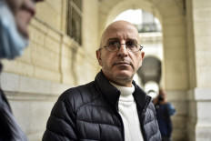 Said Djabelkhir, a renowned Algerian scholar on Islam, looks on outside the Sidi M’hamed courthouse in Algeria's capital Algiers on April 22, 2021. 