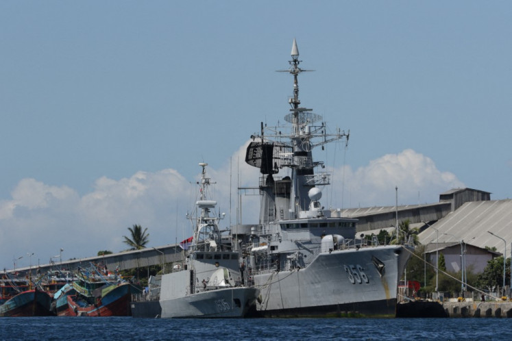 Indonesian navy ships arrive at the naval base in Banyuwangi on April 22, 2021, to join in the search for a decades-old navy submarine that went missing off the coast of Bali with 53 crew aboard during regular exercises. 