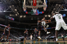 Giannis Antetokounmpo #34 of the Milwaukee Bucks drives to the basket against the Philadelphia 76ers on April 22, 2021at the Fiserv Forum Center in Milwaukee, Wisconsin.
