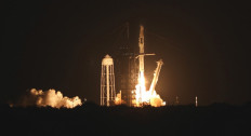 A SpaceX Falcon 9 rocket, carrying the Crew-2 mission astronauts, lifts off from launch complex 39A at the Kennedy Space Center in Florida on April 23, 2021. SpaceX launched its third crew to the International Space Station an hour before sunrise Friday, recycling a rocket and spacecraft for the first time. The Crew-2 mission, the first involving a European, blasted off from the Kennedy Space Center in Florida at 5:49 am Eastern Time (0949 GMT).