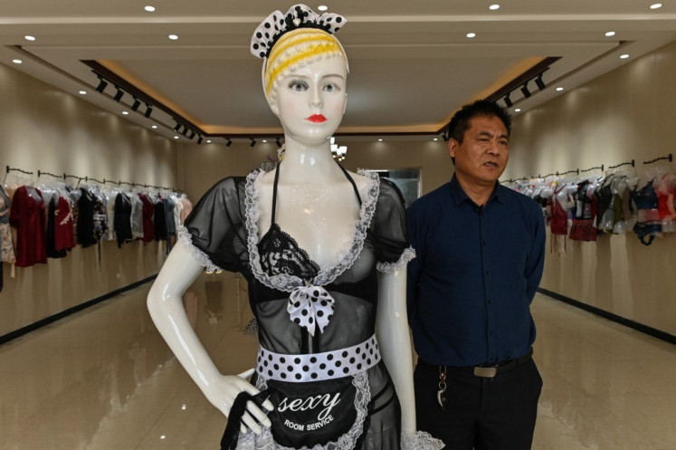 This photo taken on March 25, 2021 shows Chang Kailin speaking during an interview with AFP at his lingerie factory in Guanyun county, some 50 kilometres from Lianyungang in China's northeastern Jiangsu province. Americans like their lingerie to be risque, Europeans prefer it more classy, and Chinese remain a bit shy but are opening up. But the biggest order of all came from North Korea.