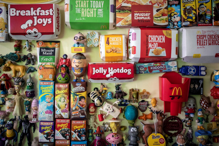 Fast-food fun: Toys and fast-food packaging are pictured in the home of Percival Lugue, who has the Guinness world record for the largest fast-food toy collection, on April 20, 2021, in Apalit, Pampanga province, the Philippines.