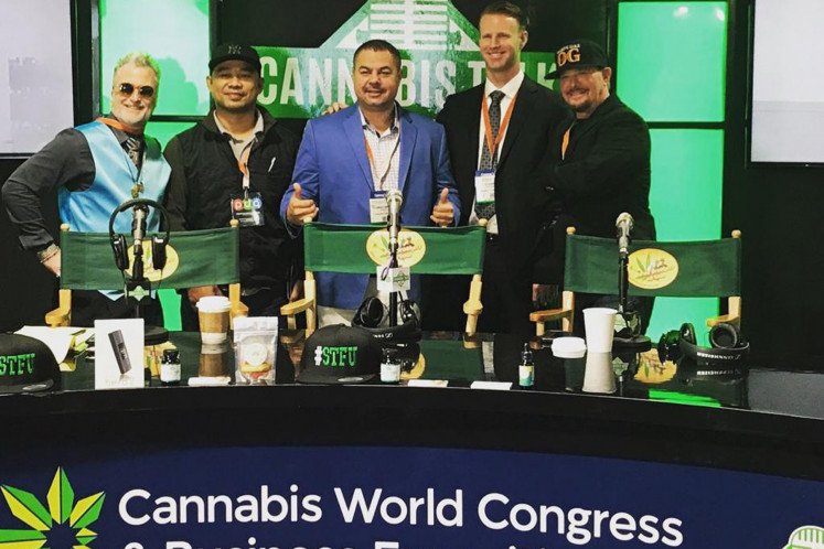 Rom (second from left) at a congress meeting of cannabis farmers in the United States. 