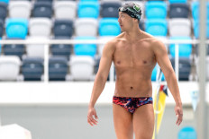 In this photo taken on April 29, 2021, Myanmar swimmer Win Htet Oo attends a training session at the Melbourne Aquatic Centre in Melbourne. Win Htet Oo is sacrificing his dream of competing in the Tokyo Olympics to protest at the junta ruling his homeland, saying that taking part would be 