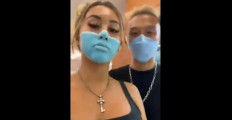 Social media influencers Leia Se (left) and Josh Paler Lin (right) seen in this screen grab posing for the camera during a prank in a Bali supermarket.