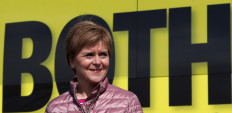 Scottish First Minister Nicola Sturgeon stands by her campaign bus while visiting Pocra Quay as she campaigns during the parliamentary elections in Aberdeen, Scotland, on May 5, 2021. The Scottish Parliament election is to be held on May 6, 2021.
