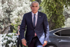 Yair Lapid, leader of the Yesh Atid (There Is a Future) party, arrives at the Israeli President's residence in Jerusalem on May 5, 2021. 