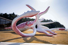  Japan town builds giant squid statue with Covid grant 