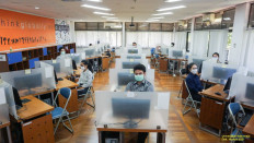 New normal: University entrance exams 2021 were held offline at the University of Indonesia in Depok, West Java, but there remains differing opinions about campus offline learning. 