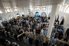 In this picture taken on April 23, 2021, Muslim devotees offer Friday noon prayer at a mosque during their holy month of Ramadan in Islamabad amid the Covid-19 coronavirus pandemic. Schools and restaurants have closed, shops pull down their shutters early every night, and the military has been mobilised to combat the spread of coronavirus -- but night after night the faithful crowd into mosques across Pakistan for prayers.