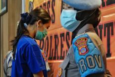 Woman charged with premeditated murder in accidental poisoning of 10-year-old boy