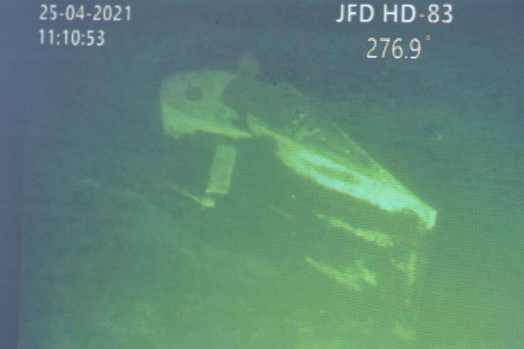 A photo of a part of the downed KRI Nanggala-402 as photographed by a underwater remotely operated vehicle (ROV) from Singapore's  MV Swift Rescue is shown during a press briefing at the I Gusti Ngurah Rai airbase in Bali on April 25, 2021.