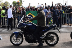  As Covid continues to rage, Bolsonaro leads motorcycle rally of supporters 