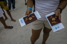  'Vaccine tourists' fly from abroad for injections on US beach 