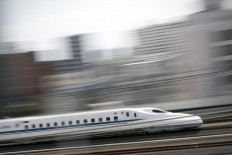 The shinkansen, known in English as the bullet train, passes through the station in Hamamatsu on September 26, 2019. 