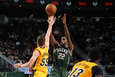 Khris Middleton #22 of the Milwaukee Bucks shoots the ball during the game against the Miami Heat during Round 1, Game 1 of the 2021 NBA Playoffs on May 22, 2021 at the Fiserv Forum Center in Milwaukee, Wisconsin. 