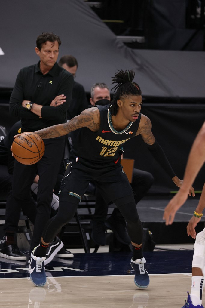 Ja Morant #12 of the Memphis Grizzlies dribbles the ball during the game against the Utah Jazz during Round 1, Game 1 of the 2021 NBA Playoffs on May 23, 2021 at vivint.SmartHome Arena in Salt Lake City, Utah.