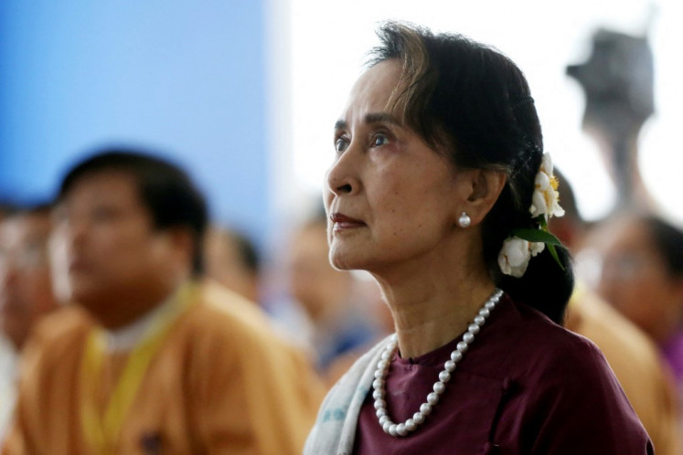 In this file photo taken on July 17, 2019, Myanmar's State Counsellor Aung San Suu Kyi attends the opening ceremony of the Yangon Innovation Centre in Yangon. Detained Myanmar leader Aung San Suu Kyi on May 24, 2021 voiced defiance in her first public comments since being held in a coup, vowing her ousted political party would 
