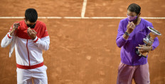 Nadal, Djokovic eye history as Roland Garros embraces quiet night in