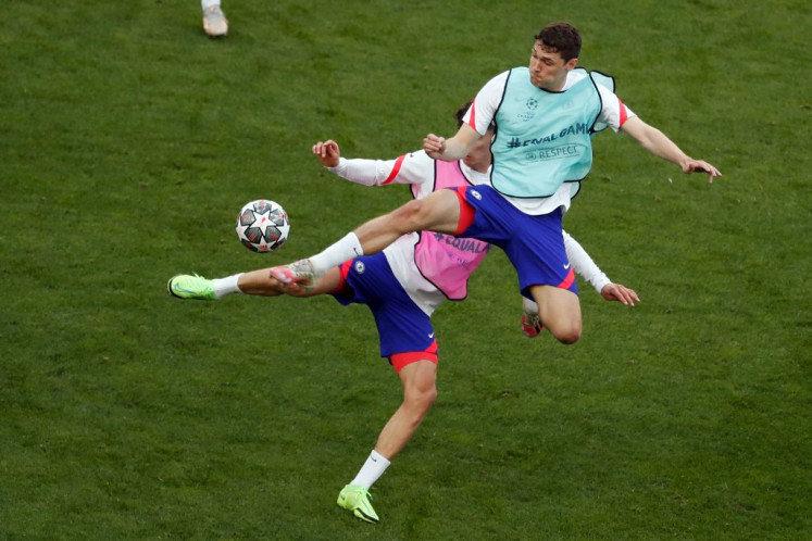 Chelsea's Danish defender Andreas Christensen (R) jumps for the ball during a training session at the Dragao stadium in Porto on May 28, 2021 on the eve of the UEFA Champions League final football match between Manchester City and Chelsea.