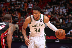Giannis delivers triple double as NBA Bucks sweep Miami