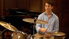 Miles Teller was reportedly punched by someone accusing the 'Whiplash' star of owing him $60,000.
