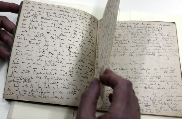 Original manuscripts written in German by Jewish German-speaking novelist and story writer Franz Kafka are displayed at the National Library of Israel in Jerusalem, on May 31, 2021. The National Library of Israel's Franz Kafka Papers are now online for the first time, following an intensive years-long process of conservation and restoration work, cataloguing and digitisation of the work of one of the major figures of 20th-century literature.