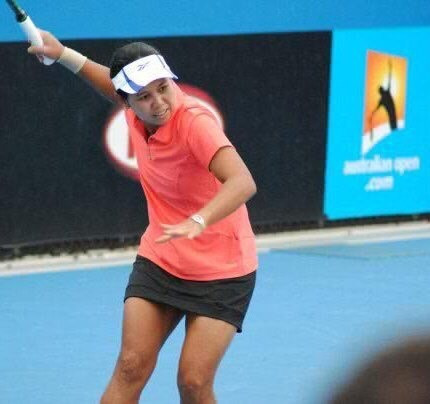 Hard-hitting: Yayuk Basuki in action at the 2010 Australian Open, partnered with Japan's Kimiko Date. 