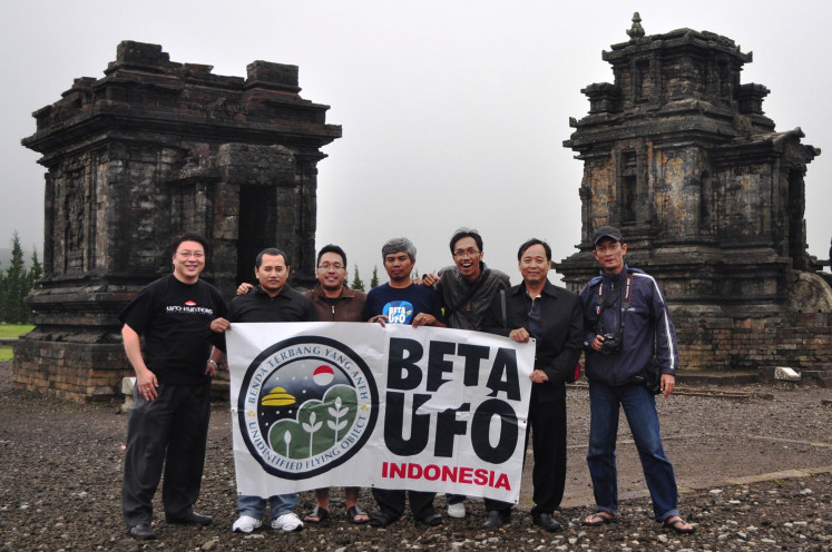 Surveying: Nur Agustinus (far left) and other BETA-UFO members during a field survey at Dieng Temple, Central Java in 2011