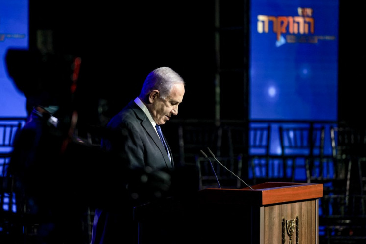 Israeli Prime Minister Benjamin Netanyahu speaks during a Health Ministry-organised appreciation ceremony for health system personnel and partner agencies for their contribution against the COVID-19 coronavirus pandemic, in Jerusalem on June 6, 2021. 